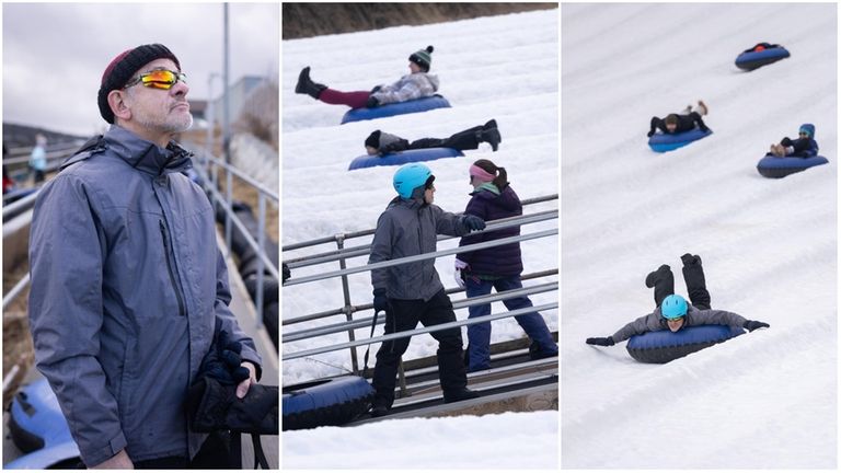 Newsday travel writer Scott Vogel rides the tubing conveyor belt lift...