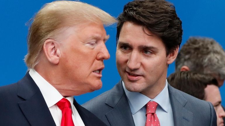 U.S. President Donald Trump, left, and Canadian Prime Minister Justin...