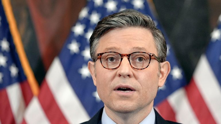 Speaker of the House Mike Johnson, R-La., talks during a...