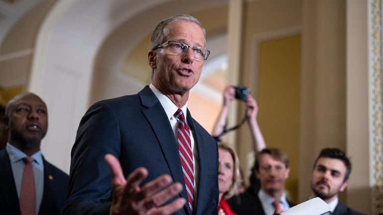 Senate Minority Whip John Thune, R-S.D., meets with reporters after...