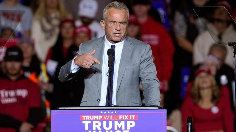 Robert F. Kennedy Jr., speaks before President-elect Donald Trump at...