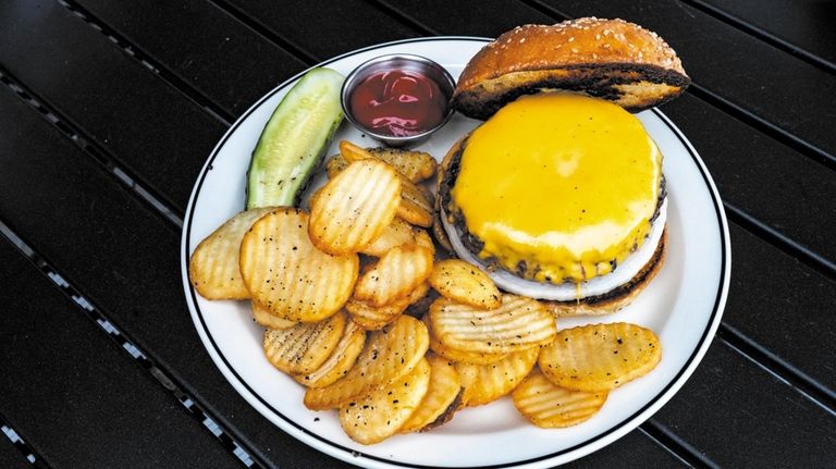 The cheeseburger and fries.at Sag Harbor Tavern in Sag Harbor.