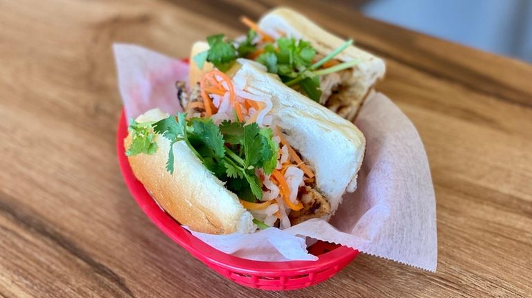 A grilled barbecue chicken banh mi at the Rolling Spring Roll...