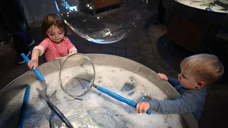 Ella Hadden, 2, of East Meadow, left, and Archer Greaney,...