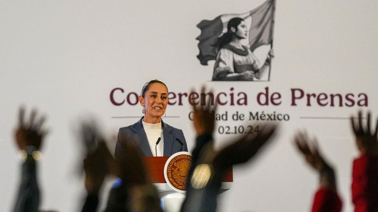 Mexican President Claudia Sheinbaum gives a media briefing at the...