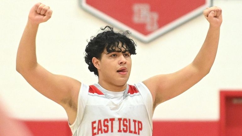 James Mendoza of East Islip react as his team closes in...