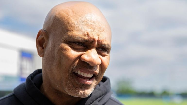 New York Giants defensive backs coach Jerome Henderson at training...