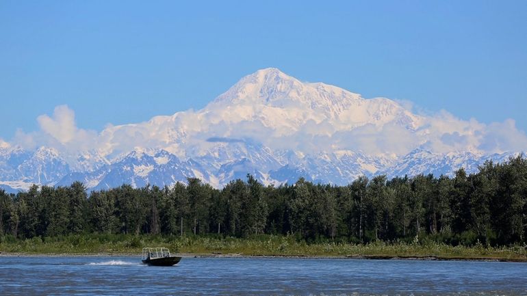 A boat is seen on the Susitna River near Talkeetna,...