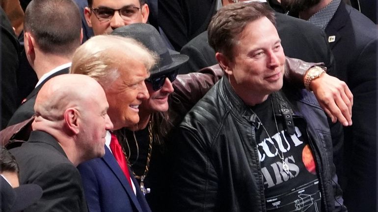 President-elect Donald Trump poses for a photo with Dana White,...