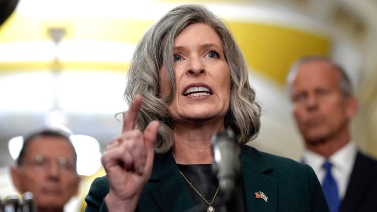 Sen. Joni Ernst, R-Iowa, talks after a policy luncheon on...