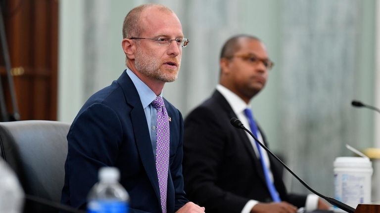 Brendan Carr answers questions during a Senate Commerce, Science, and...