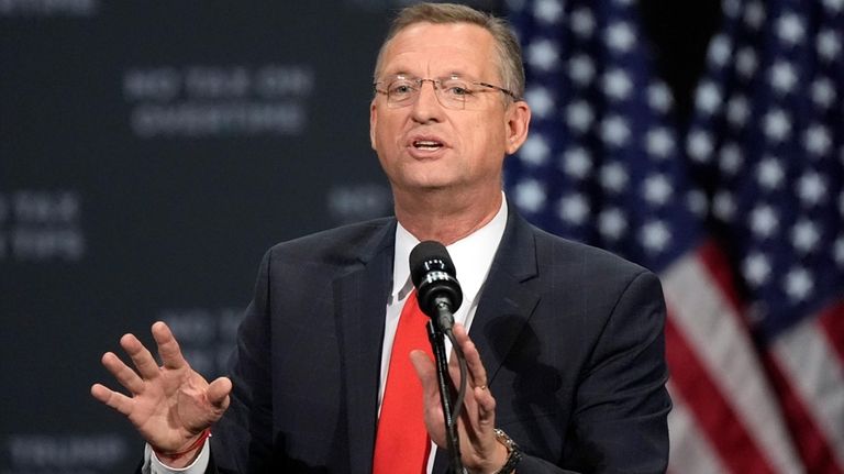 Former Rep. Doug Collins speaks before President-elect Donald Trump at...