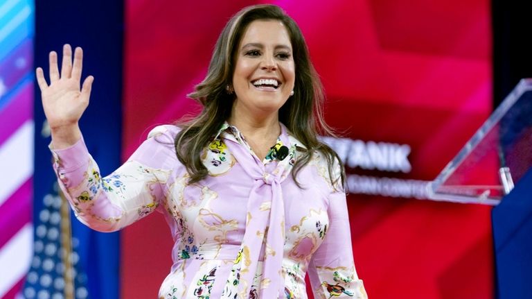 Republican Conference Chair Rep. Elise Stefanik, R-N.Y., waves to supporters...