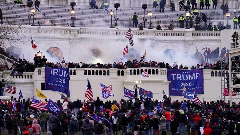 Violent rioters, loyal to President Donald Trump, storm the Capitol...